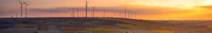 Wind turbines amongst farming fields