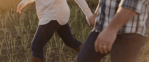 Couple holding hands