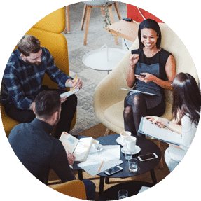 A group of professionals having an informal meeting at work