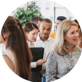 A group of people at a professional networking event