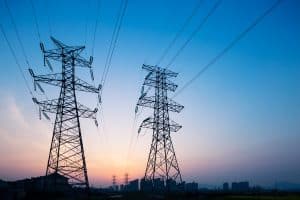 landscape of steel power tower in blue sky at sunrise